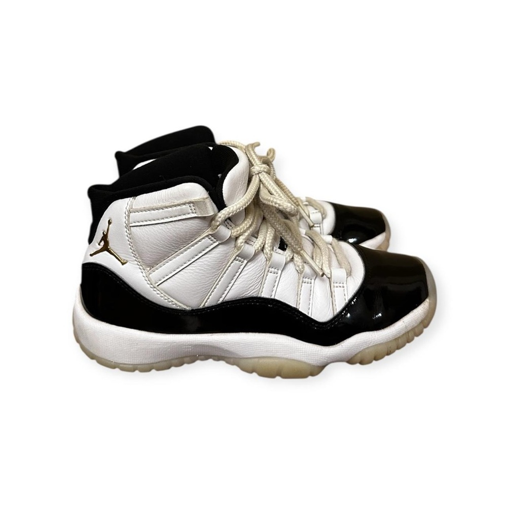 Jordan GS 4.5Y Black and White Retro 11 with Gold Jumpman Sneakers